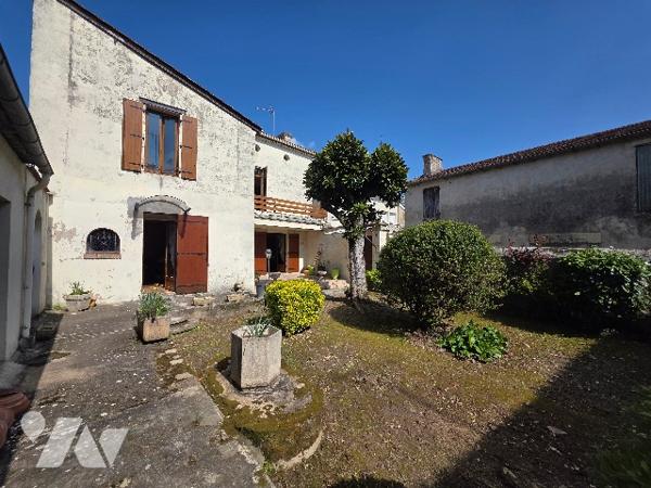 Maison de village 180 m² avec grand garage et beaux volumes – Proche Marmande