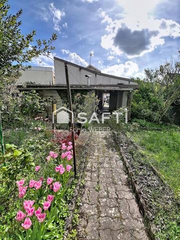 À 2 PAS DU CENTRE VILLE MAISON INDIVIDUELLE AVEC GARAGE ET JARDIN