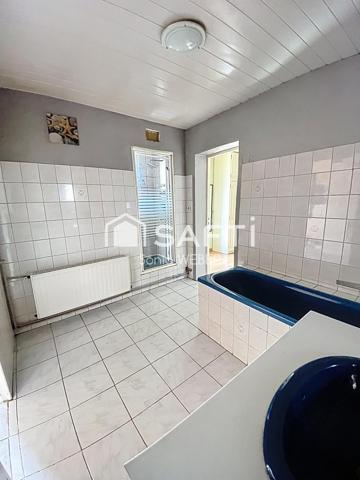 À 2 PAS DU CENTRE VILLE MAISON INDIVIDUELLE AVEC GARAGE ET JARDIN