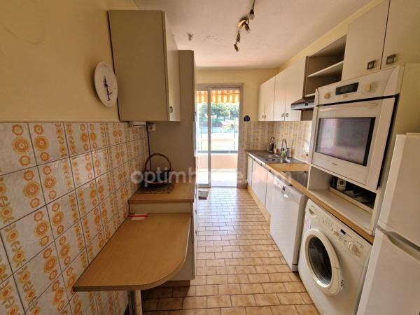 Appartement 3 pièces avec grande terrasse, garage et cave