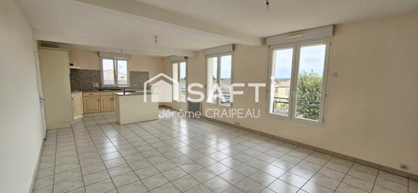 2 logements de 3 chambres, 2 garages et atelier en centre-ville.