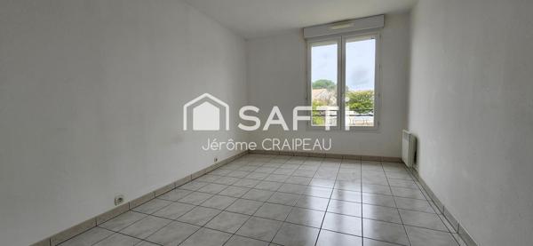 2 logements de 3 chambres, 2 garages et atelier en centre-ville.