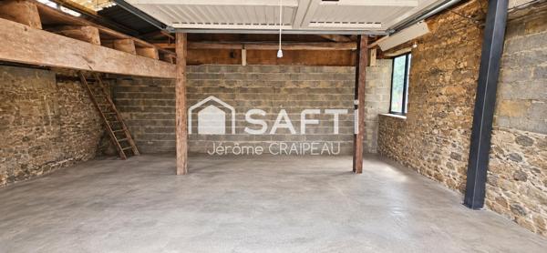 2 logements de 3 chambres, 2 garages et atelier en centre-ville.