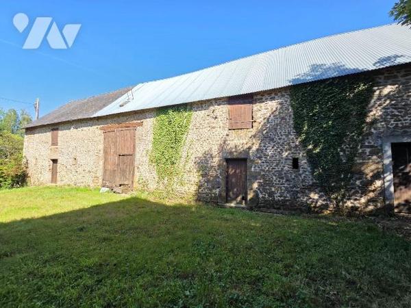 10 min. VILLAINES-LA-JUHEL (53), en campagne, ensemble immobilier composé :
-d'une maison d'ha...