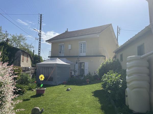 Maison lumineuse avec jardin