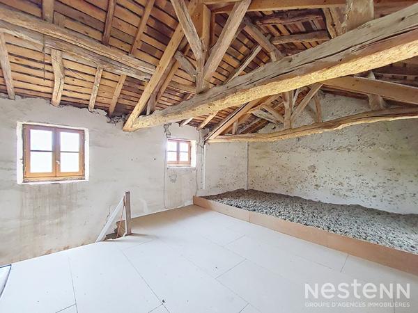 A Vendre Maison de ville en pierre de 123 m² habitable de plain-pied à proximité immédiate des commodités