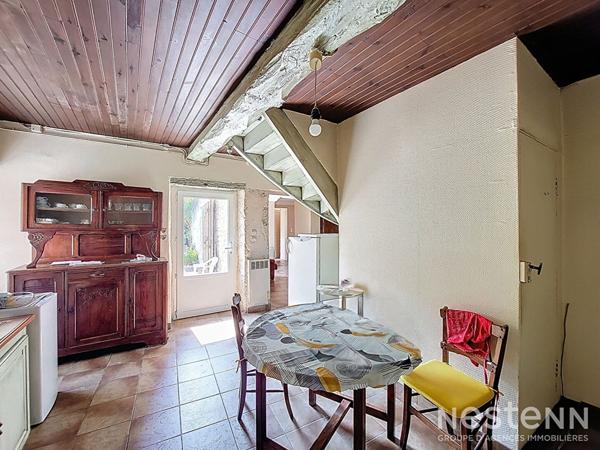 A Vendre Maison de ville en pierre de 123 m² habitable de plain-pied à proximité immédiate des commodités