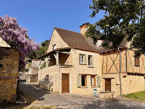 Charmante maison de village en pierre avec terrasse couverte