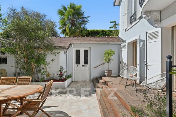 Maison familiale avec cour et patio arborés