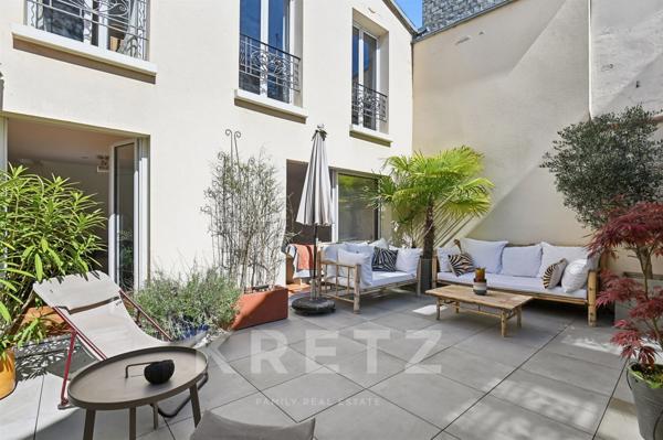 Maison familiale avec cour et patio arborés