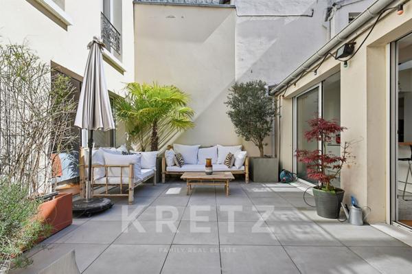 Maison familiale avec cour et patio arborés