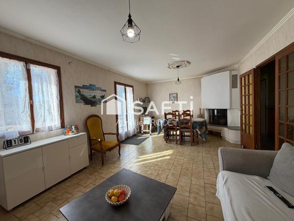 Maison de plain-pied avec garage, 3 chambres.