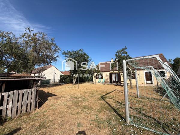 Maison de plain-pied avec garage, 3 chambres.