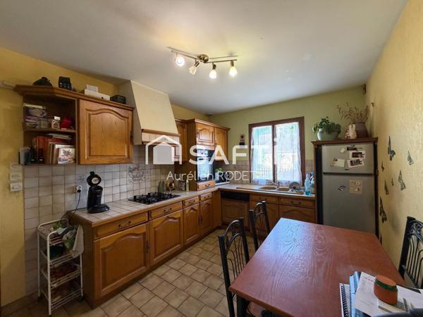 Maison de plain-pied avec garage, 3 chambres.