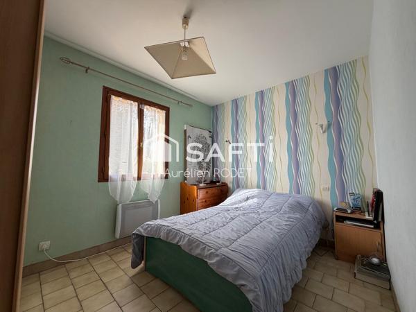 Maison de plain-pied avec garage, 3 chambres.
