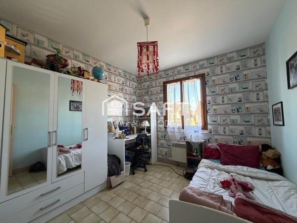 Maison de plain-pied avec garage, 3 chambres.
