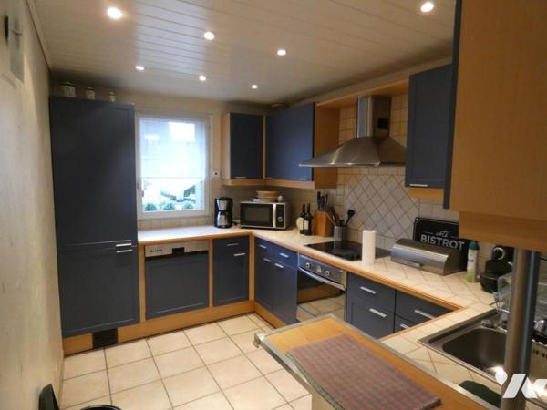Comines maison familiale 3 chambres avec combles aménagés garage et Jardin