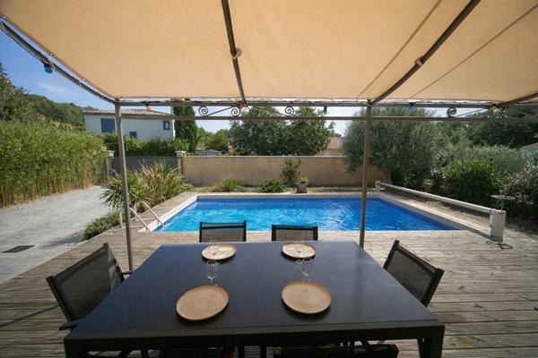 Maison récente aux normes RT2012 avec piscine et garage DPE B