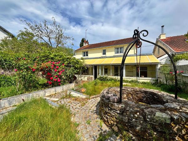 Maison familiale à rénover avec jardin et garage