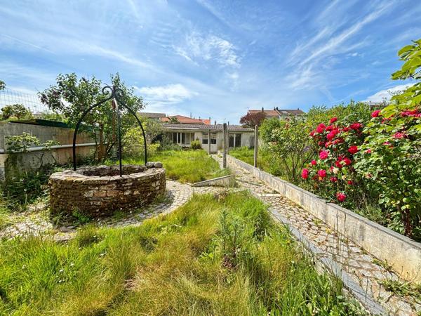 Maison familiale à rénover avec jardin et garage
