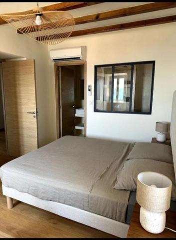 Olmeto, Maison de village en pierres de taille 4 pièce(s) 95 m2  jardin 202 m2