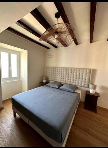 Olmeto, Maison de village en pierres de taille 4 pièce(s) 95 m2  jardin 202 m2