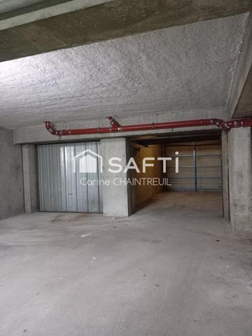 À vendre – Garage fermé + place de parking – Grange Blanche