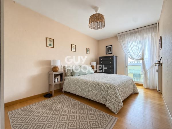 Appartement familial 5 pièces – 108 m² avec balcon et stationnement