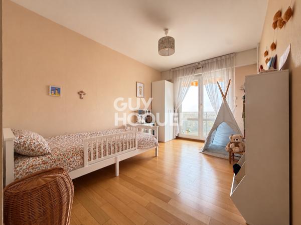 Appartement familial 5 pièces – 108 m² avec balcon et stationnement