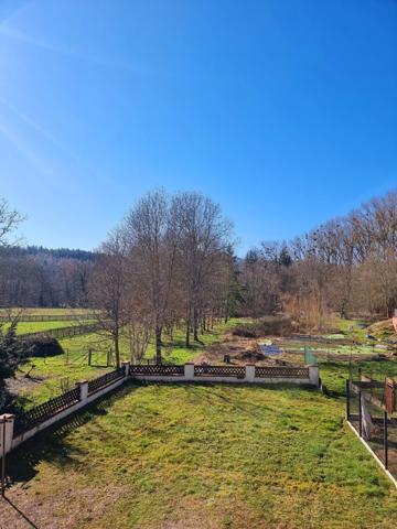 Dans un cadre verdoyant maison de 150m² sur une parcelle de 8 ares