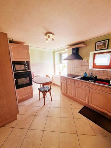 Dans un cadre verdoyant maison de 150m² sur une parcelle de 8 ares