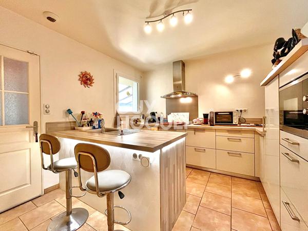 Maison de plain-pied de 115 m2, 4 chambres, un garage