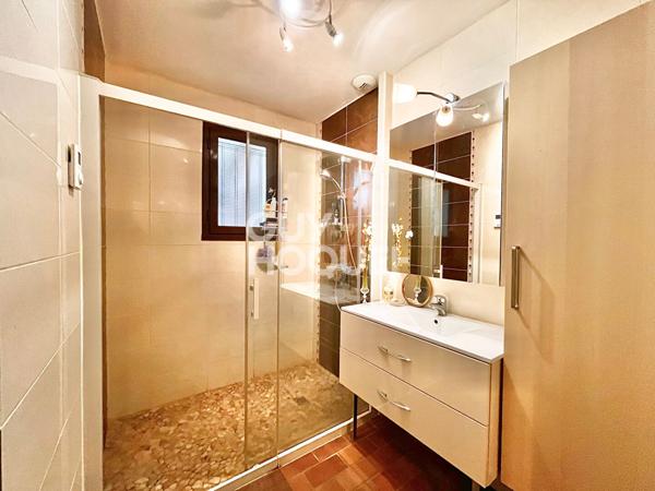 Maison de plain-pied de 115 m2, 4 chambres, un garage