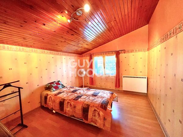 Maison de plain-pied de 115 m2, 4 chambres, un garage