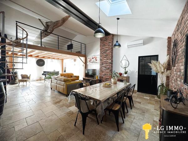 Maison de plain-pied avec jardin et garage en centre ville