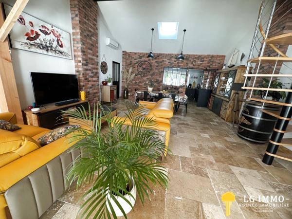 Maison de plain-pied avec jardin et garage en centre ville