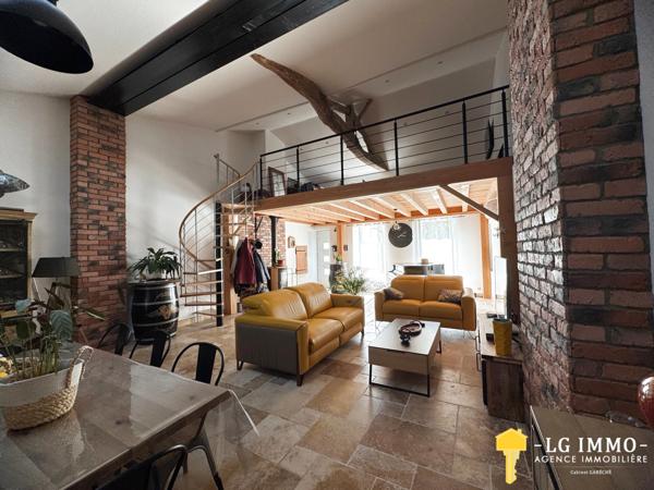 Maison de plain-pied avec jardin et garage en centre ville