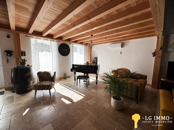 Maison de plain-pied avec jardin et garage en centre ville