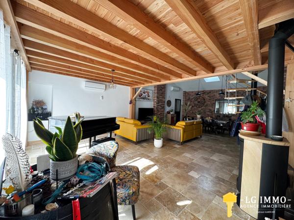 Maison de plain-pied avec jardin et garage en centre ville
