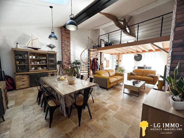 Maison de plain-pied avec jardin et garage en centre ville