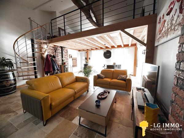 Maison de plain-pied avec jardin et garage en centre ville