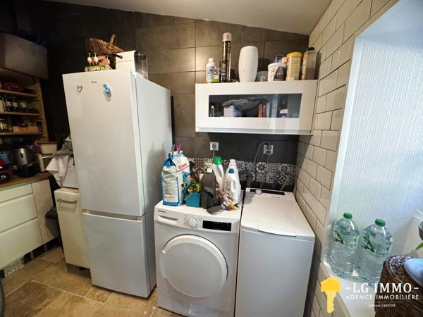 Maison de plain-pied avec jardin et garage en centre ville