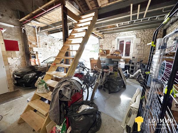 Maison de plain-pied avec jardin et garage en centre ville