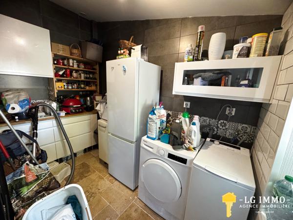 Maison de plain-pied avec jardin et garage en centre ville