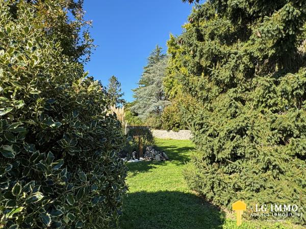Maison de plain-pied avec jardin et garage en centre ville