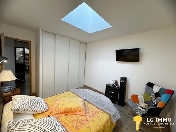 Maison de plain-pied avec jardin et garage en centre ville