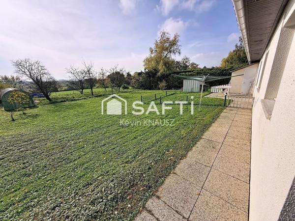 Maison de plain pied de 90m2 avec garage sur un terrain de 1400m2