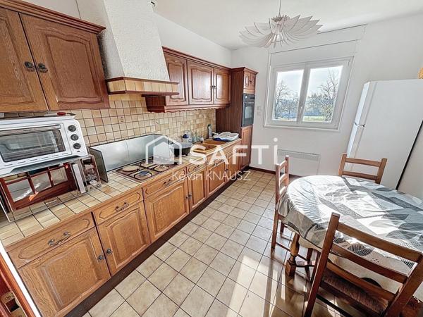 Maison de plain pied de 90m2 avec garage sur un terrain de 1400m2