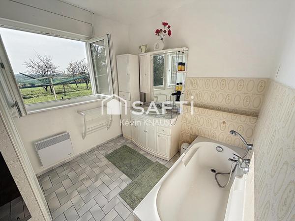 Maison de plain pied de 90m2 avec garage sur un terrain de 1400m2