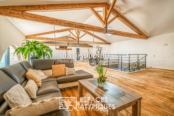 Ancienne cave viticole réhabilitée en loft avec jardin et garages